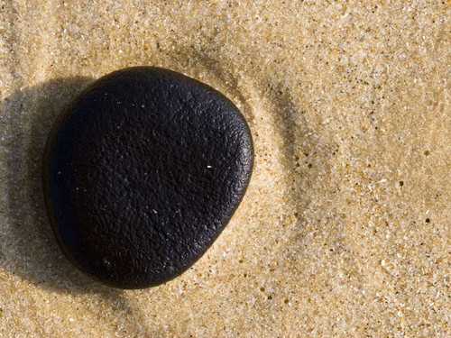 black-pebble-sandy-beach